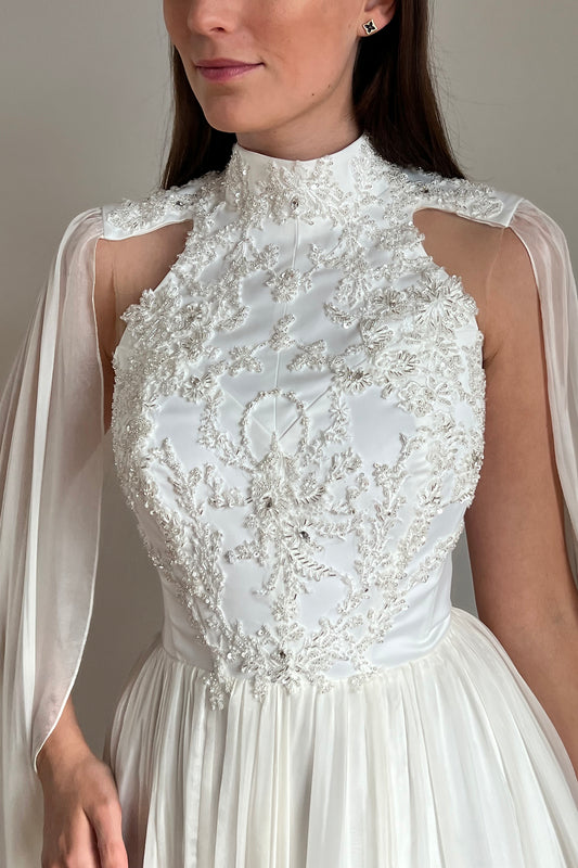 High neck wedding dress with cape sleeves