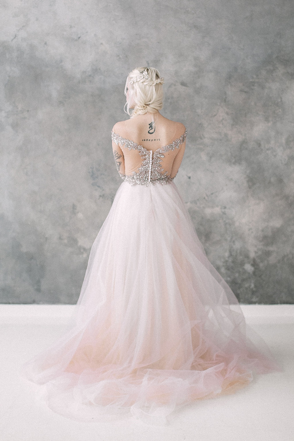 Blush tulle wedding dress with beaded bodice
