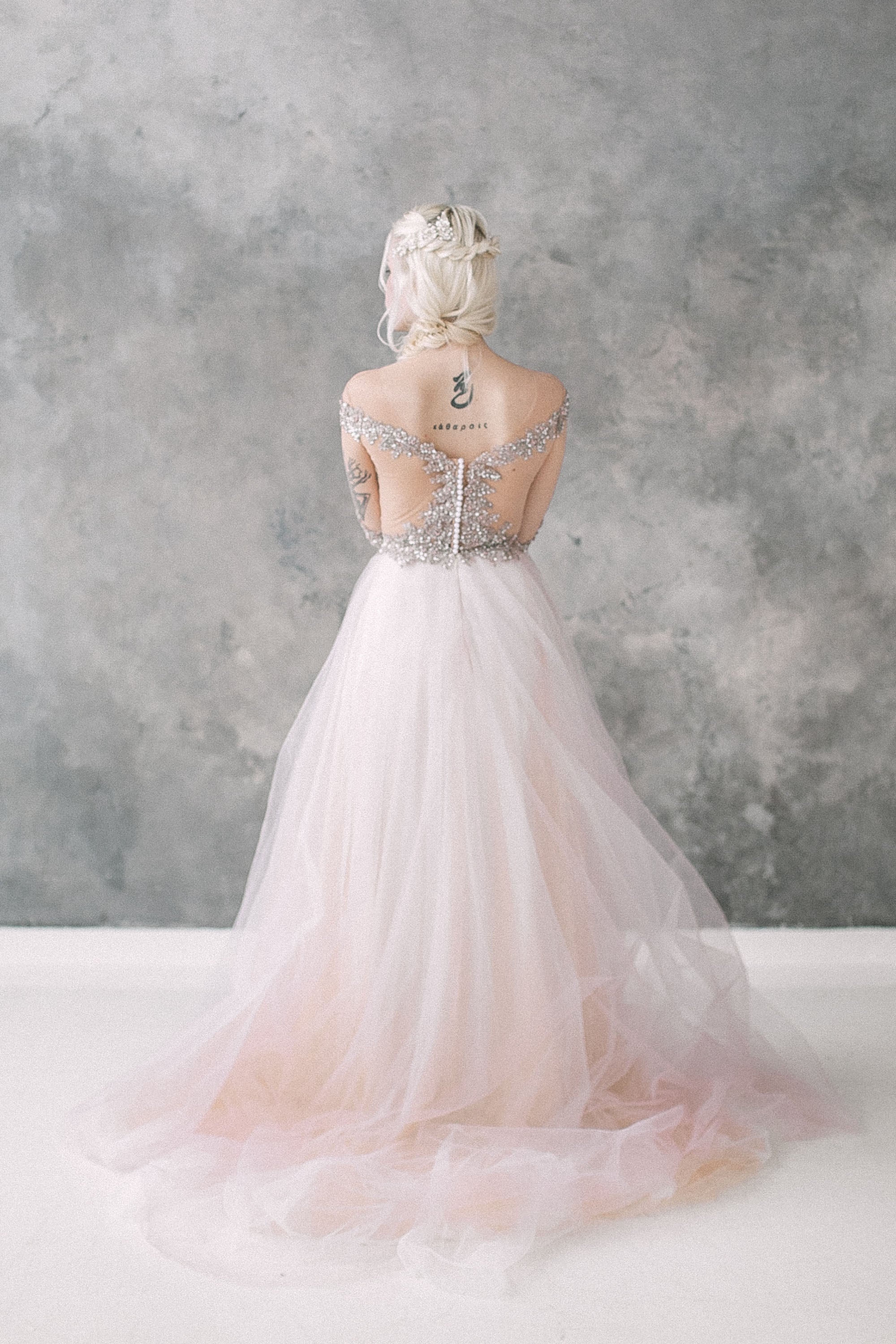 Blush tulle wedding dress with beaded bodice
