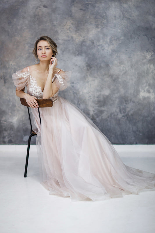 Blush tulle wedding dress with lace appliqué bodice
