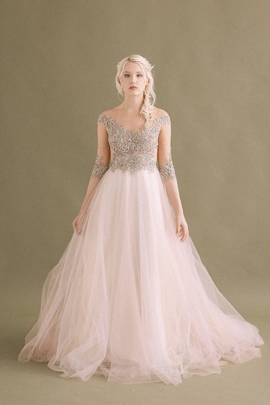 Blush tulle wedding dress with beaded bodice