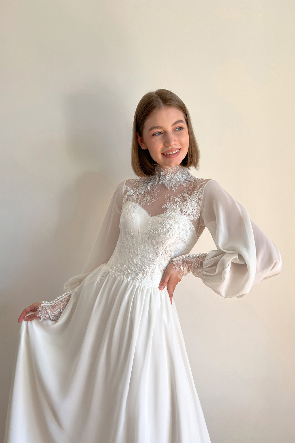 Bishop sleeve wedding dress with high neck