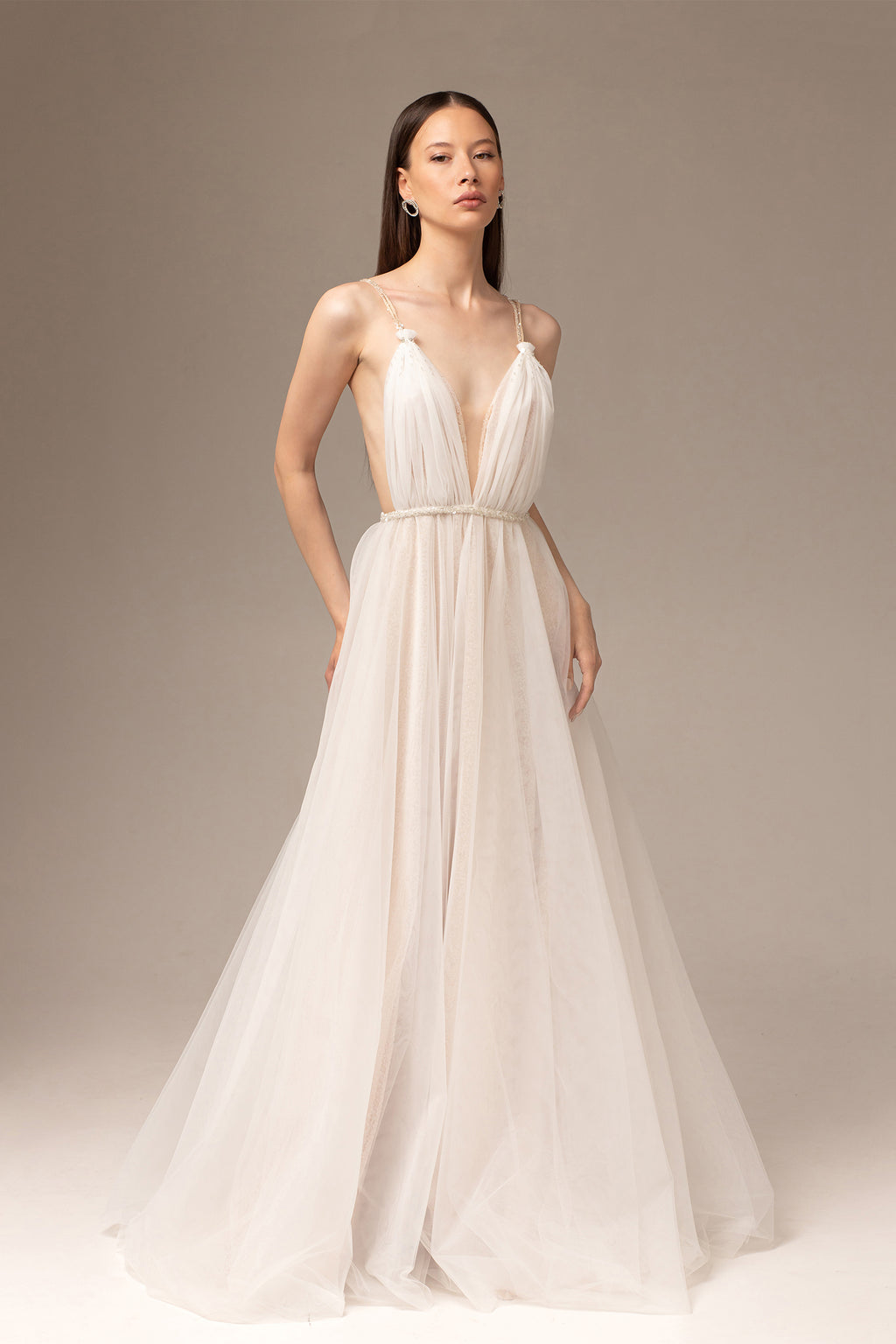 Backless draped tulle wedding dress with beaded belt