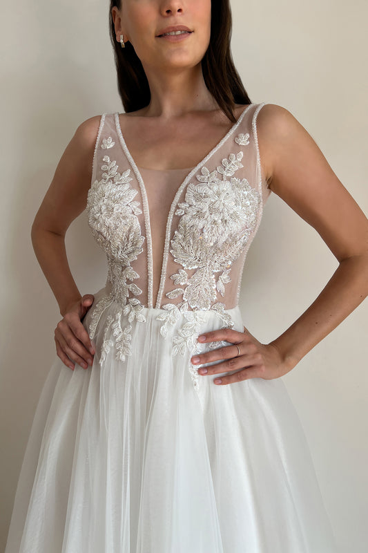 White floral embroidered wedding dress with deep V-neck