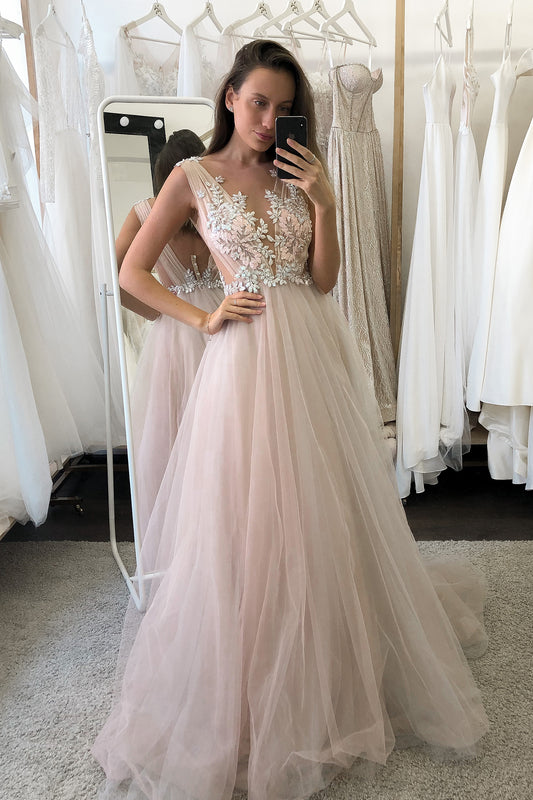 Blush pink wedding dress with floral embroidered top