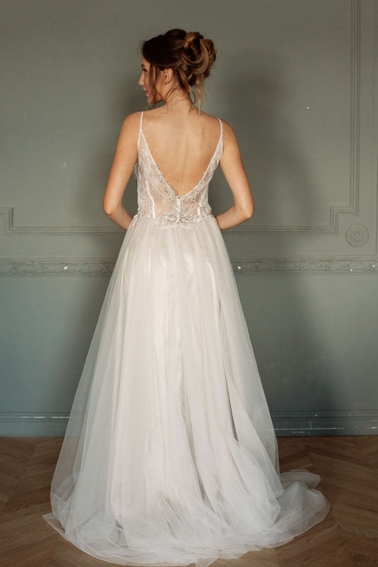 Lace top wedding dress with open back and tulle skirt