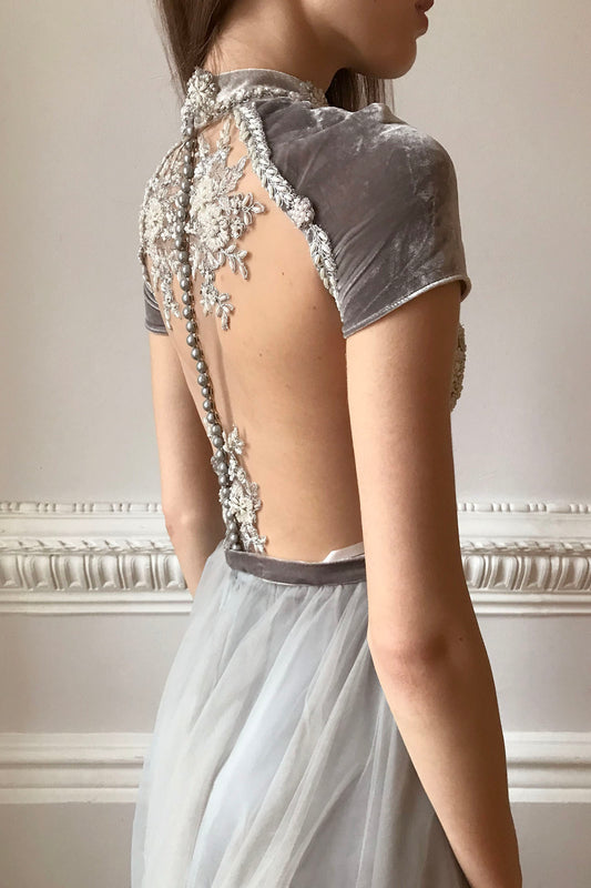 Gray wedding dress with velvet sleeves and beaded top