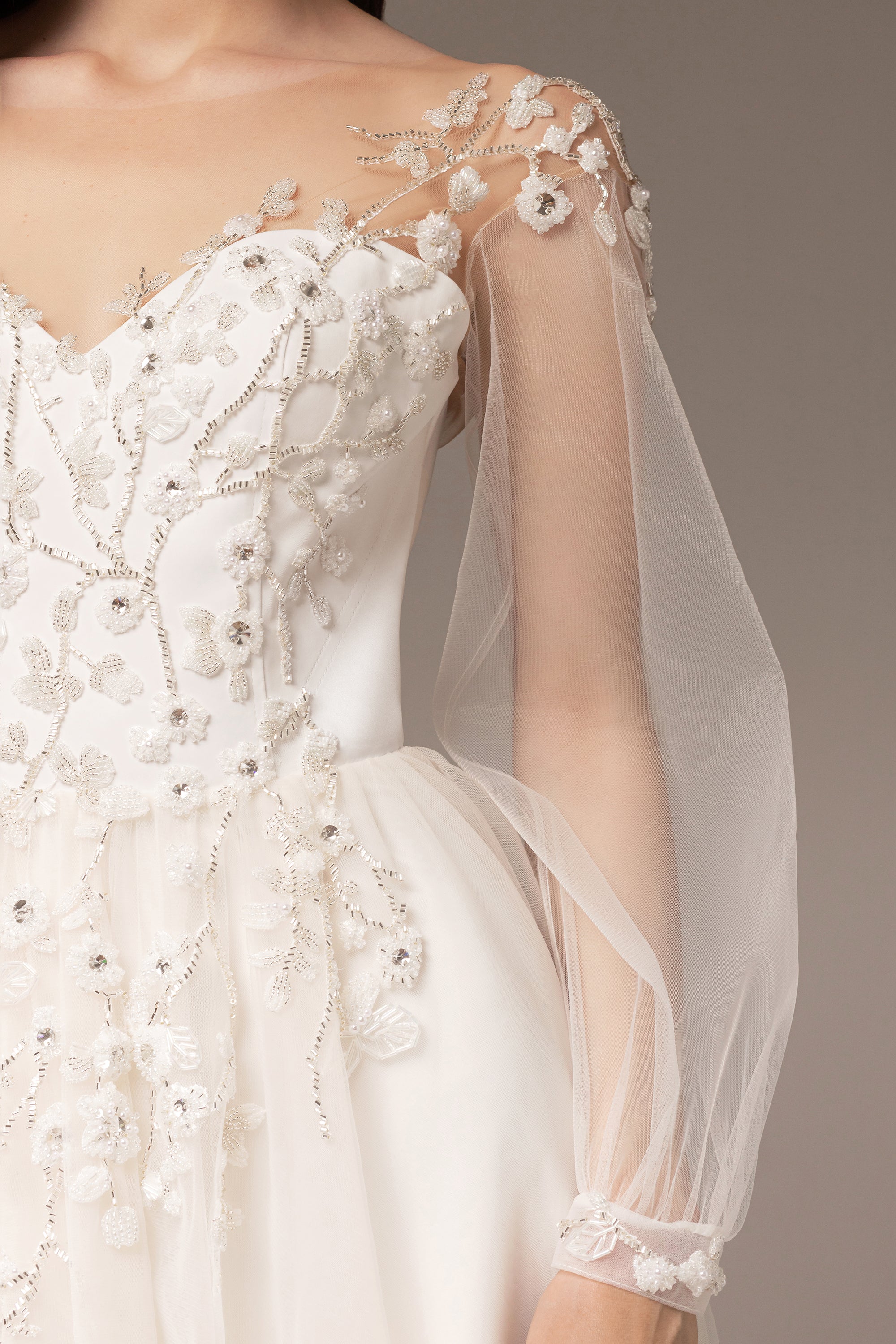 Floral embroidered wedding dress with puff sleeves