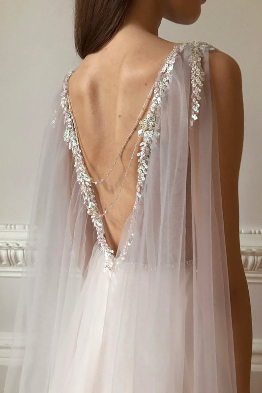 Iridescent sequin wedding dress with tulle cape
