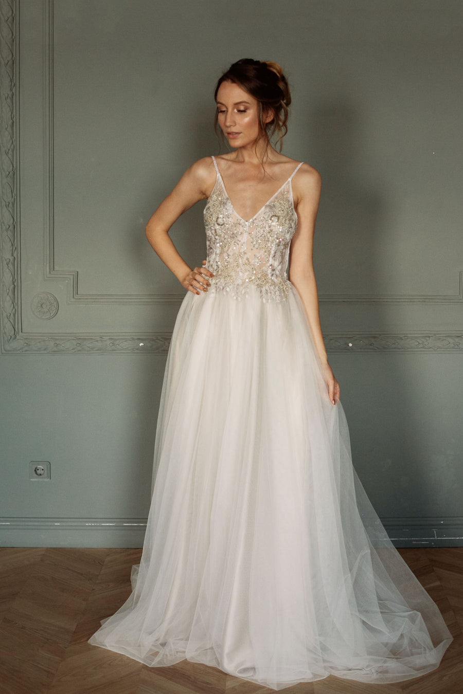 Lace top wedding dress with open back and tulle skirt