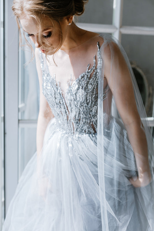 Silver sequin embroidered wedding dress with tulle cape