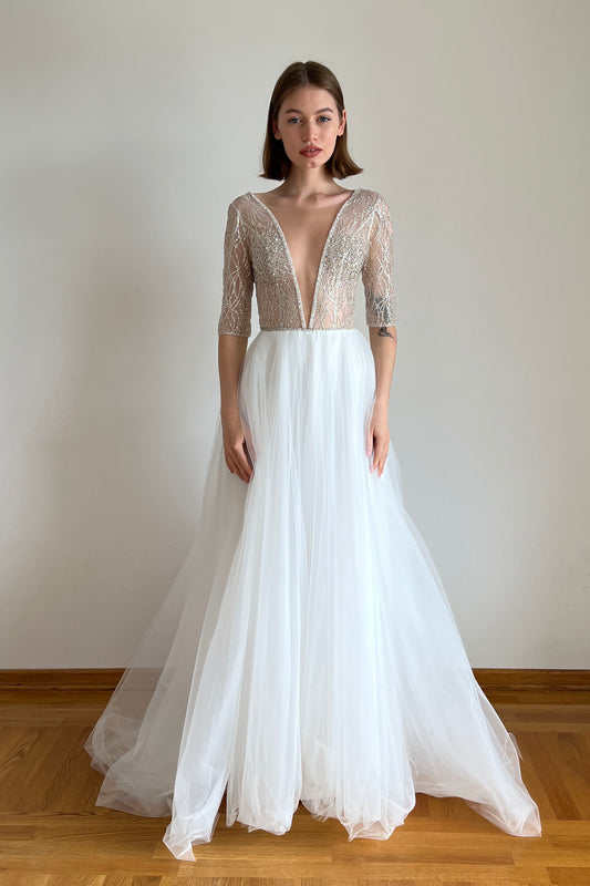 Sparkly wedding dress with deep V-neck