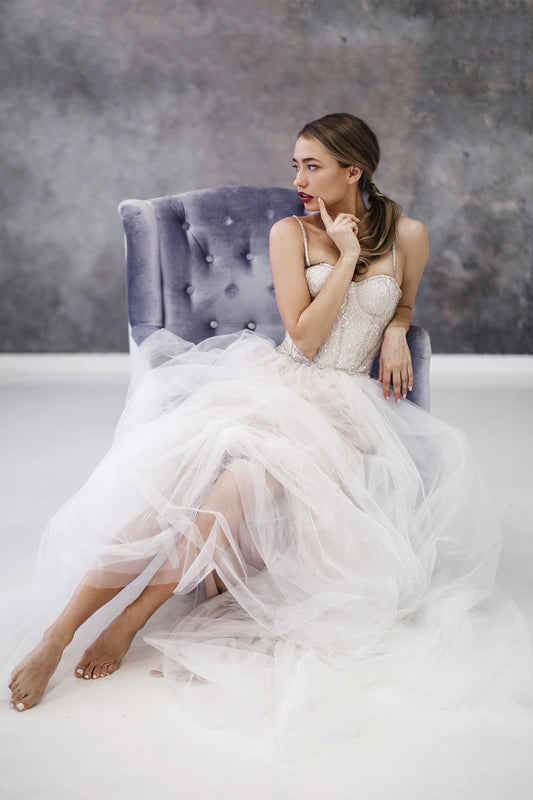 Corset wedding dress with beaded embroidery and tulle skirt