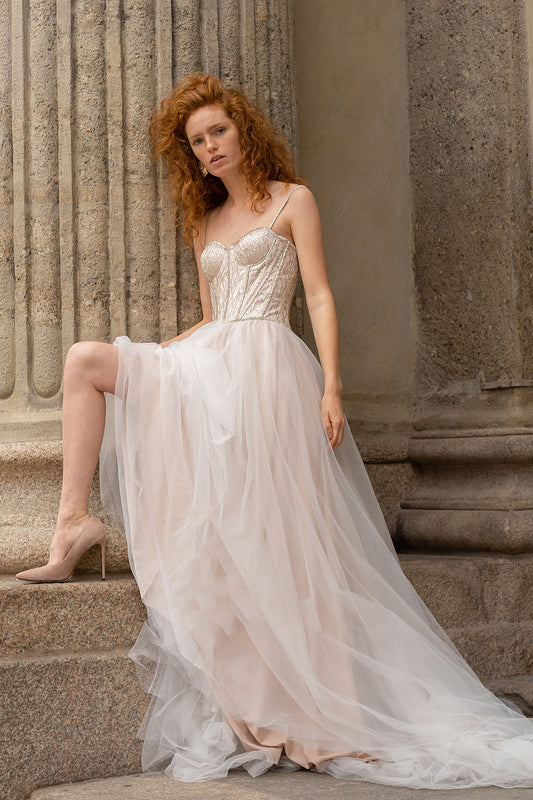 Corset wedding dress with beaded embroidery and tulle skirt