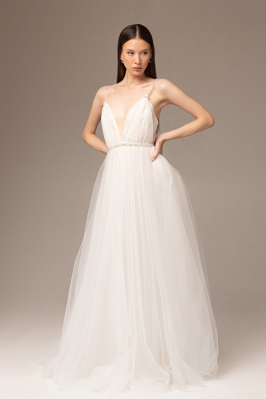Draped tulle wedding dress with deep V neckline