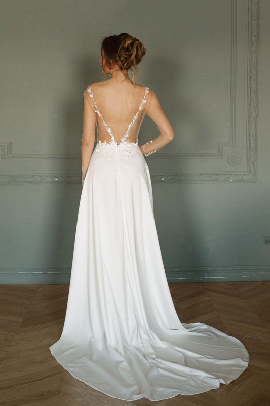 Long sleeve wedding dress with lace embroidered bodice