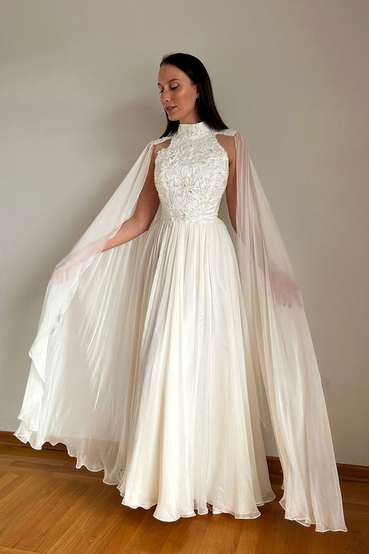 High neck wedding dress with cape sleeves